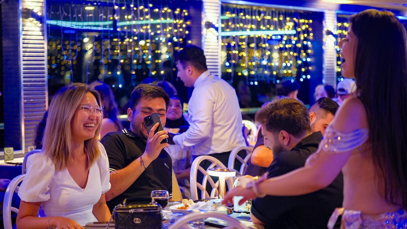 The belly dancer visits a guest table