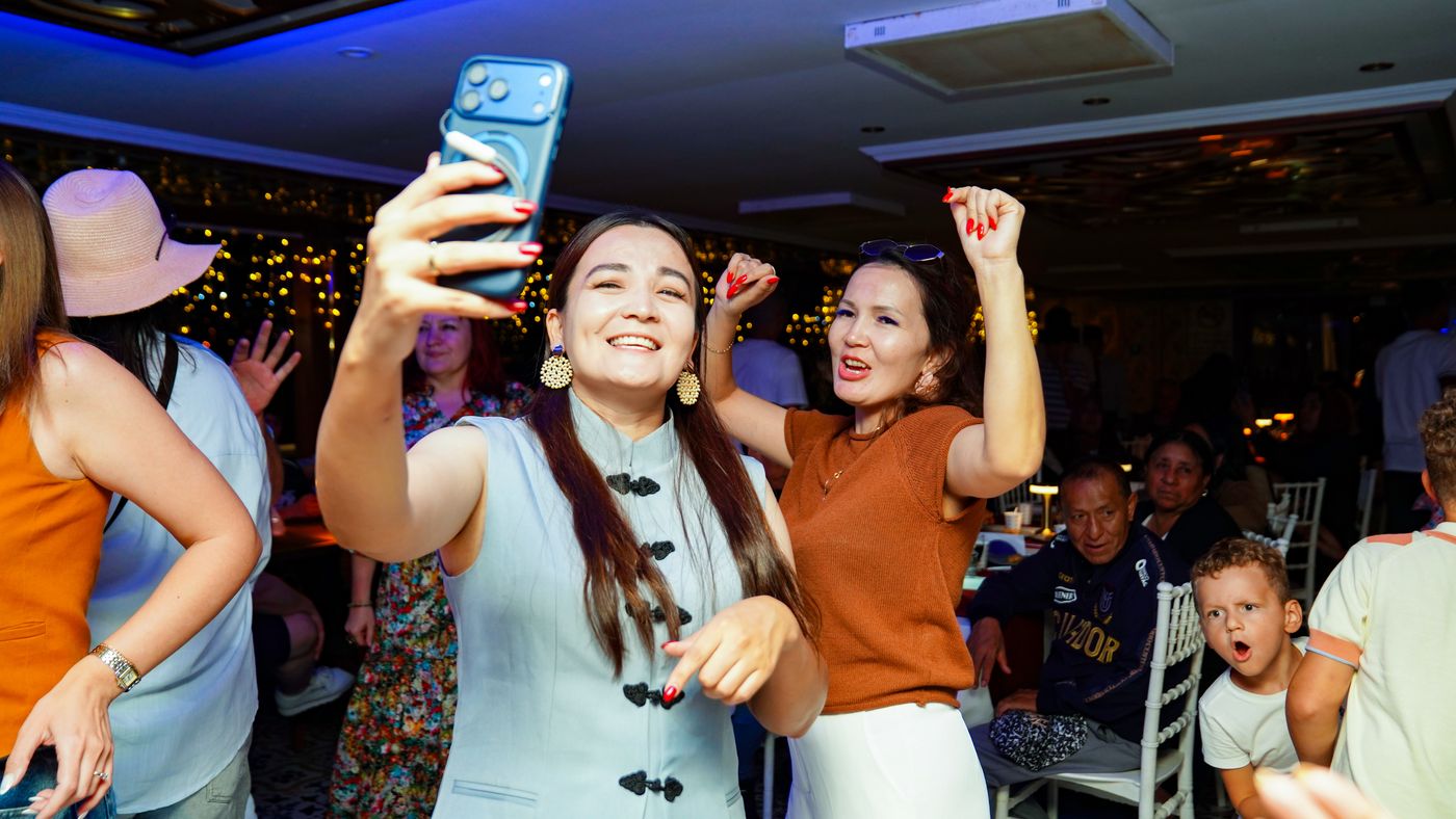 Singing along with a phone in hand